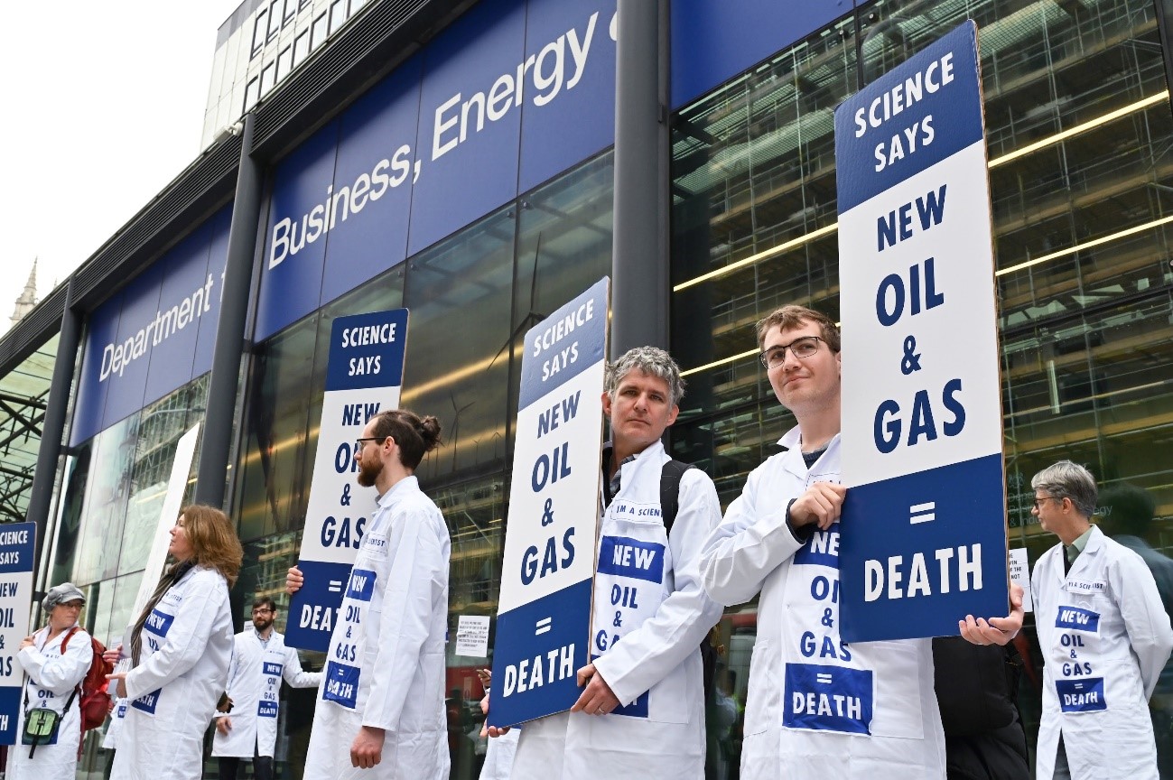 Between Two Worlds: the Scientist's Dilemma in Climate Activism