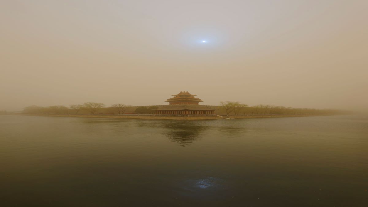 Why does East Asian dust activity decrease in the past two decades?