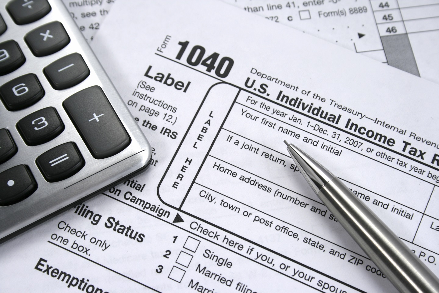 How can American expats exclude their income from US tax liability?