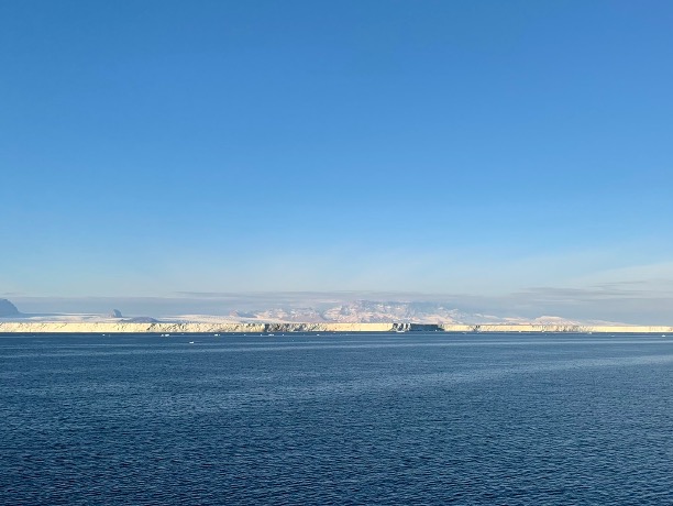 Underwater glider observations reveal eddy-driven heat transport near an Antarctic ice shelf