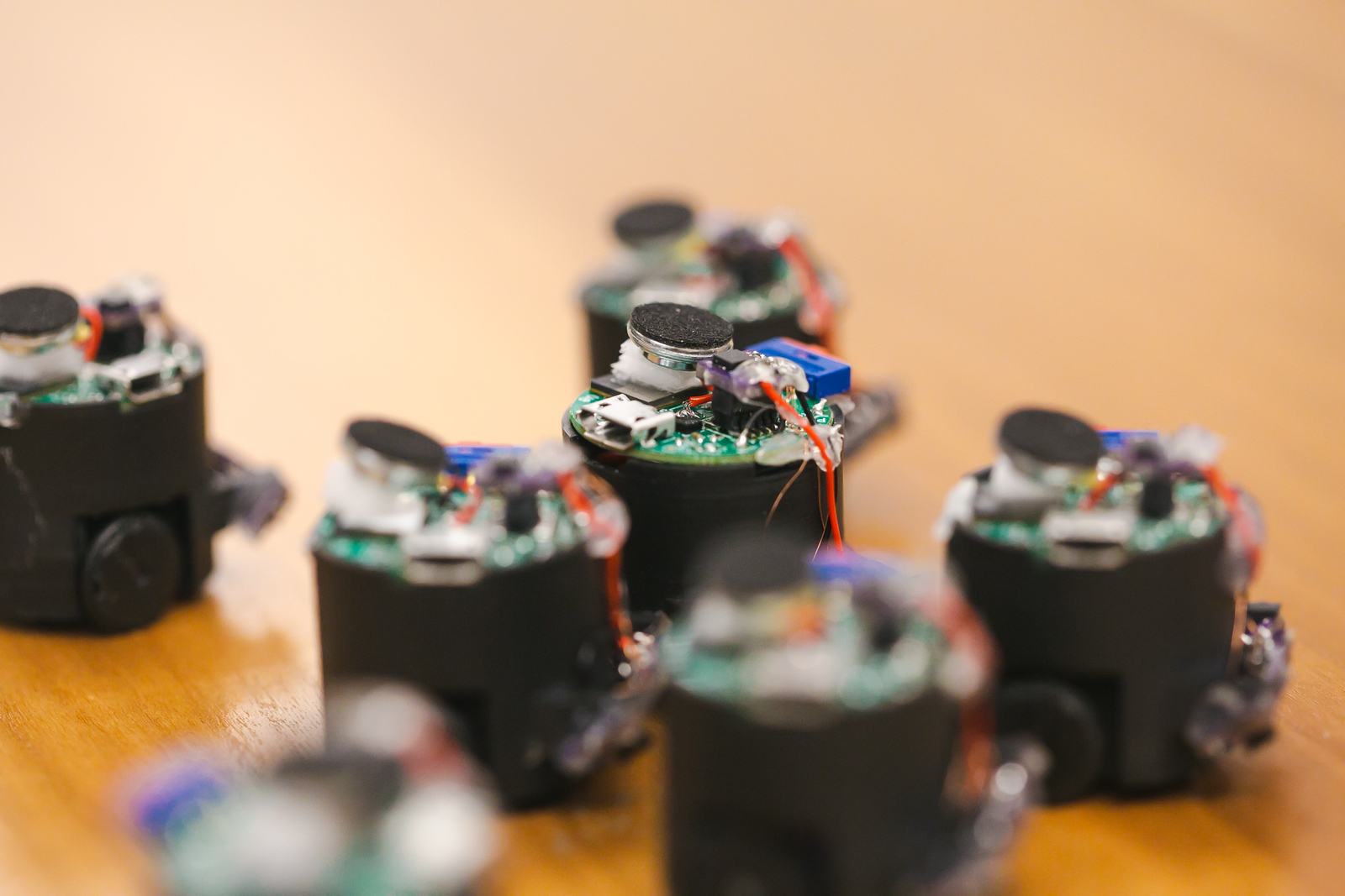 Acoustic Swarms: Robotic Swarms that Cooperatively Navigate using Sound