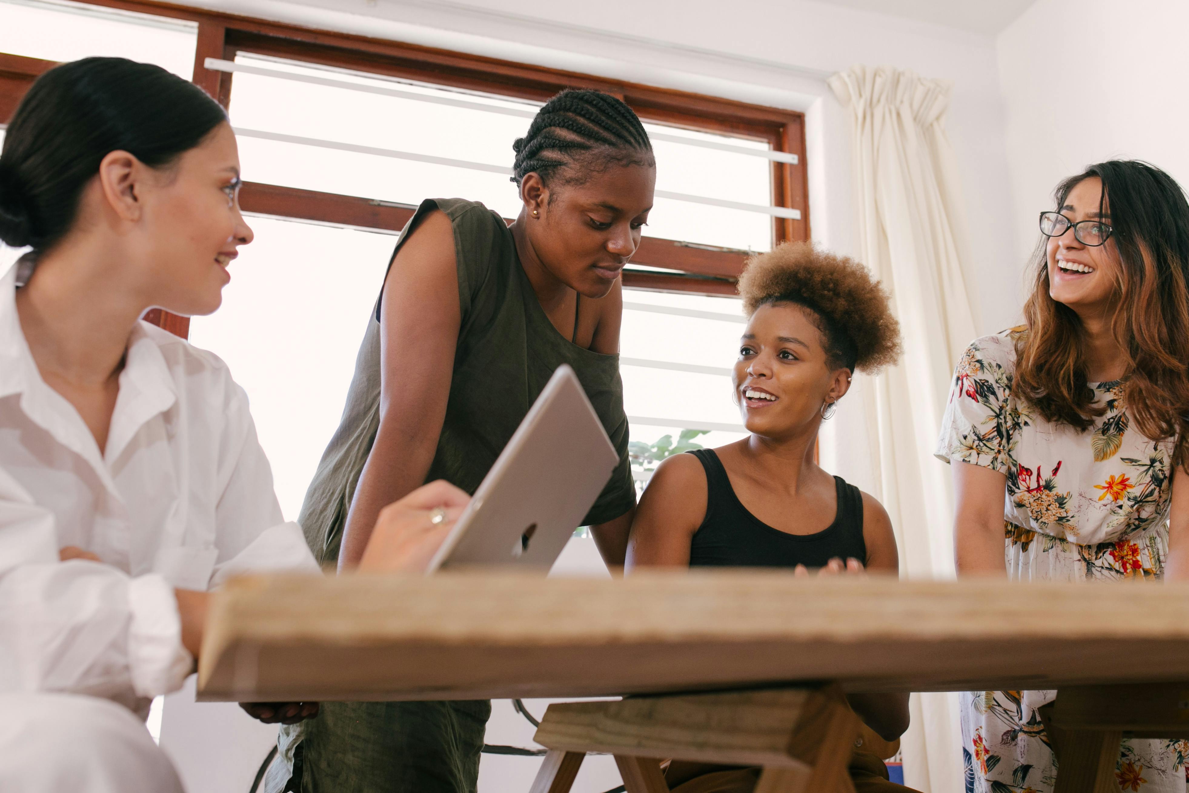 What community-level features may promote entrepreneurial opportunity for rural women?