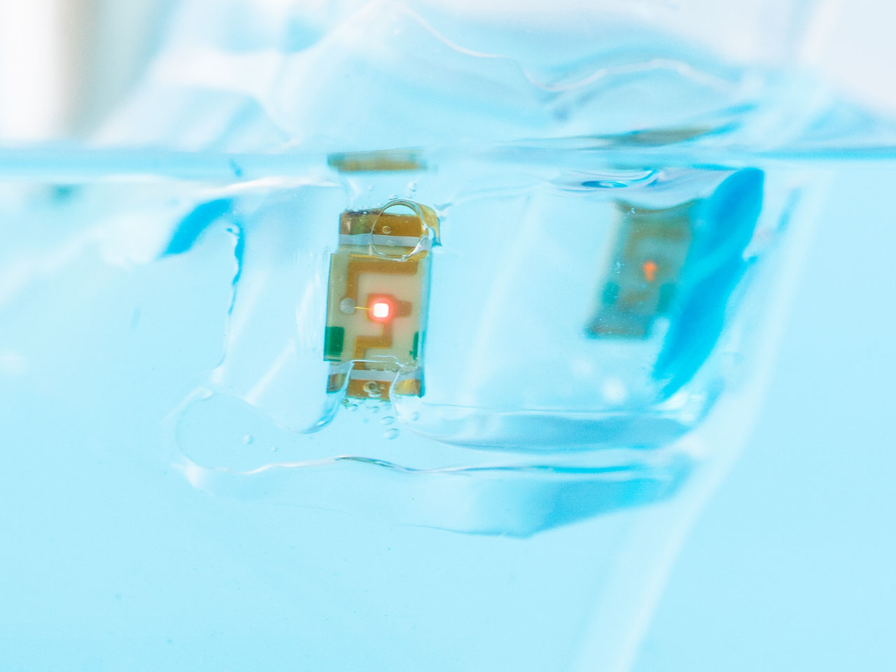 Printable water-resistant ionic circuit boards that self-repair